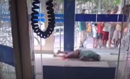 Homem é baleado ao tentar pegar arma de vigilante em um banco 